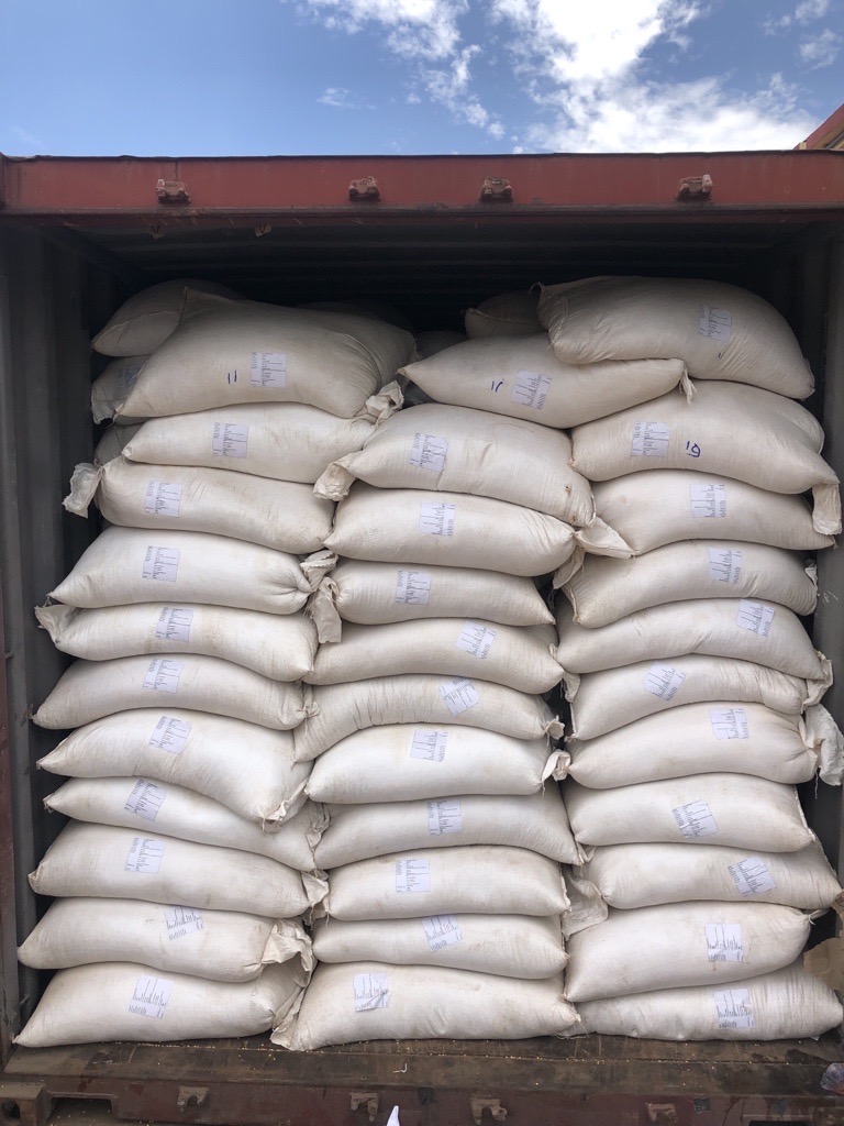 Bags of Complete Farmer product packed for export shipment